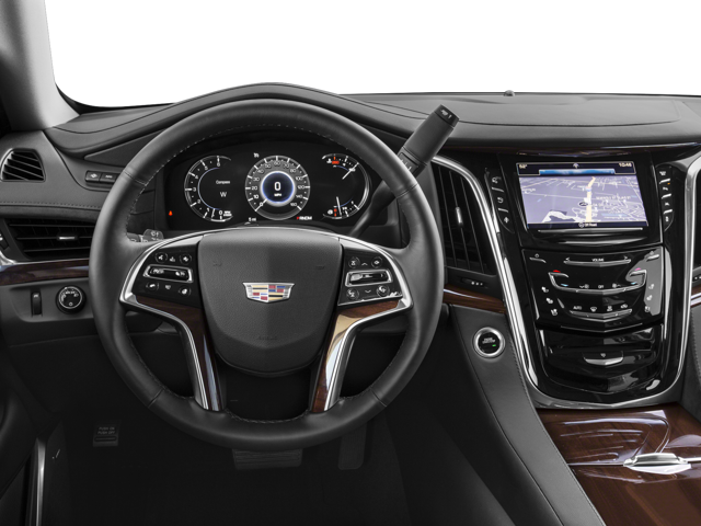Cadillac interior with a sterring wheel, digital instrument cluster