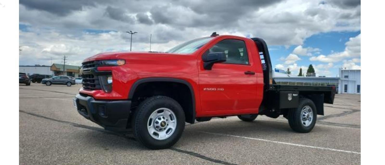 Side profile view of a parked Silverado 2500HD truck, showcasing its sleek design and robust build