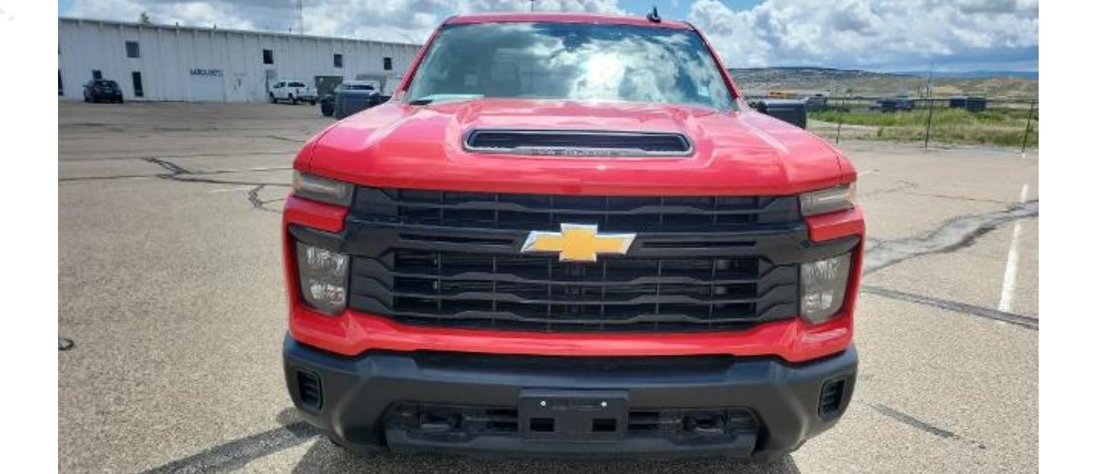 Front view of a Silverado 2500HD truck, showcasing its bold grille and rugged design